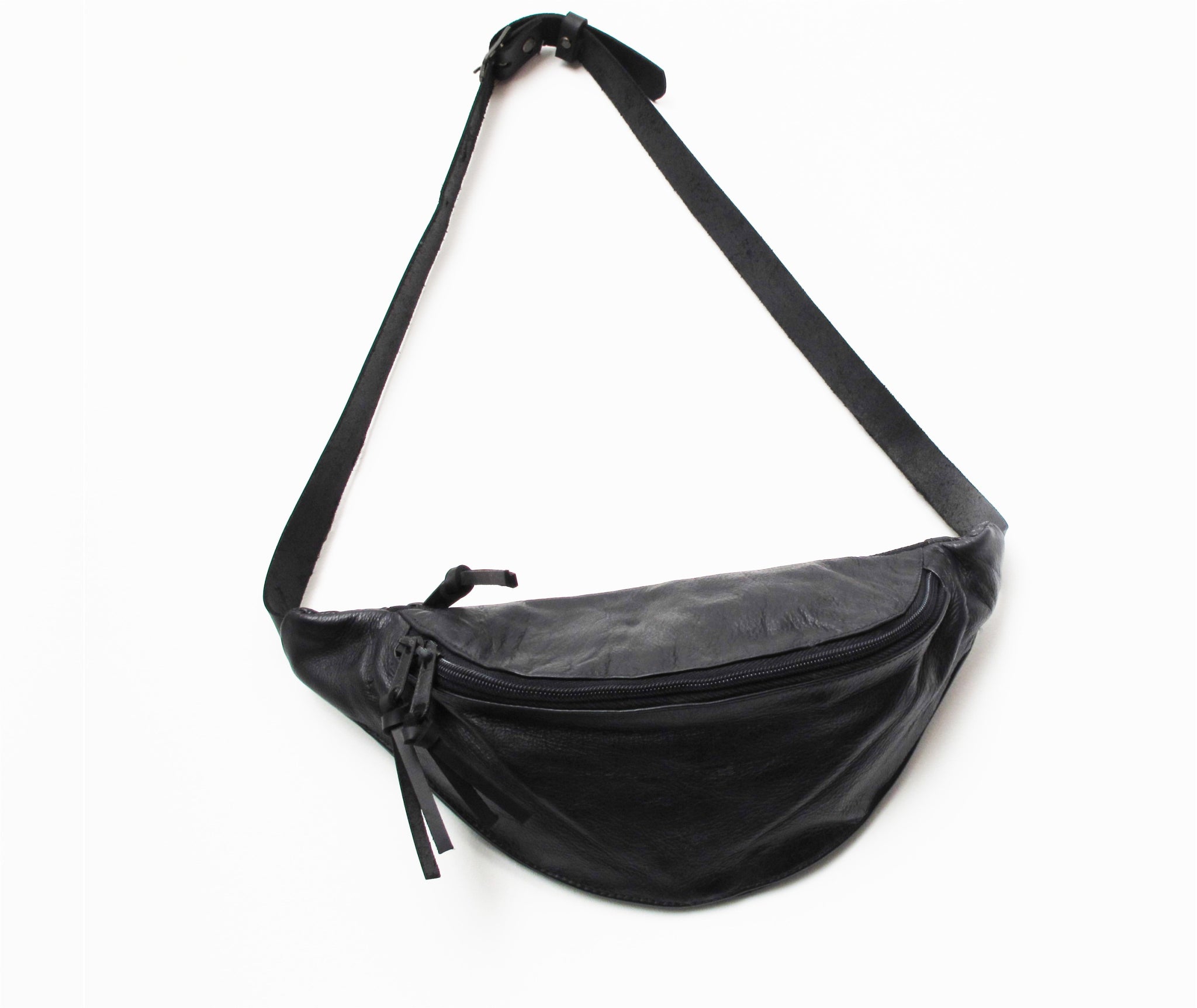 Unisex soft black leather Fannypack with an adjustable leather strap to wear crossbody, on the shoulder, or as a belt bag. The perfect accessory & gift