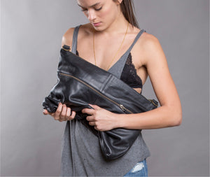 Black designer messenger bag handmade with soft Italian Napa leather suitable for laptops up to 17in with adjustable & detachable matching leather strap can be carries as a crossbody bag, shoulder bag, oversized clutch