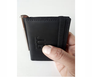 Black handmade Italian leather bifold wallet with a unique metal clip for bills and a coins pocket. The perfect lightweight slim wallet, cards wallet, and gift for men.